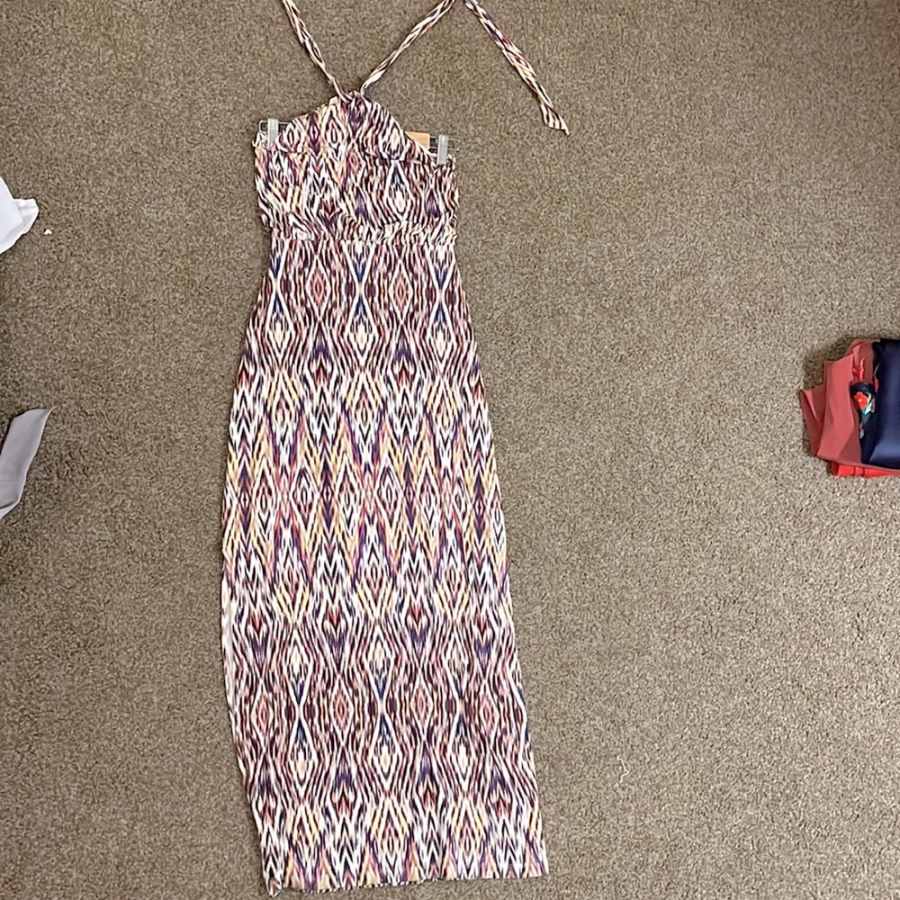 Jersey knit halter tie maxi dress. Open shoulder and back. Beautiful print.